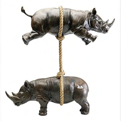 contemporary sculpture of two rhinos